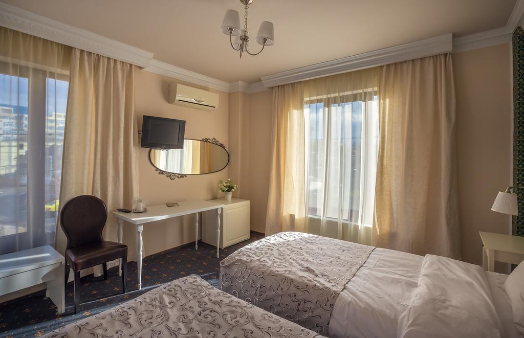 Hotel Eden Iasi Quarto foto
